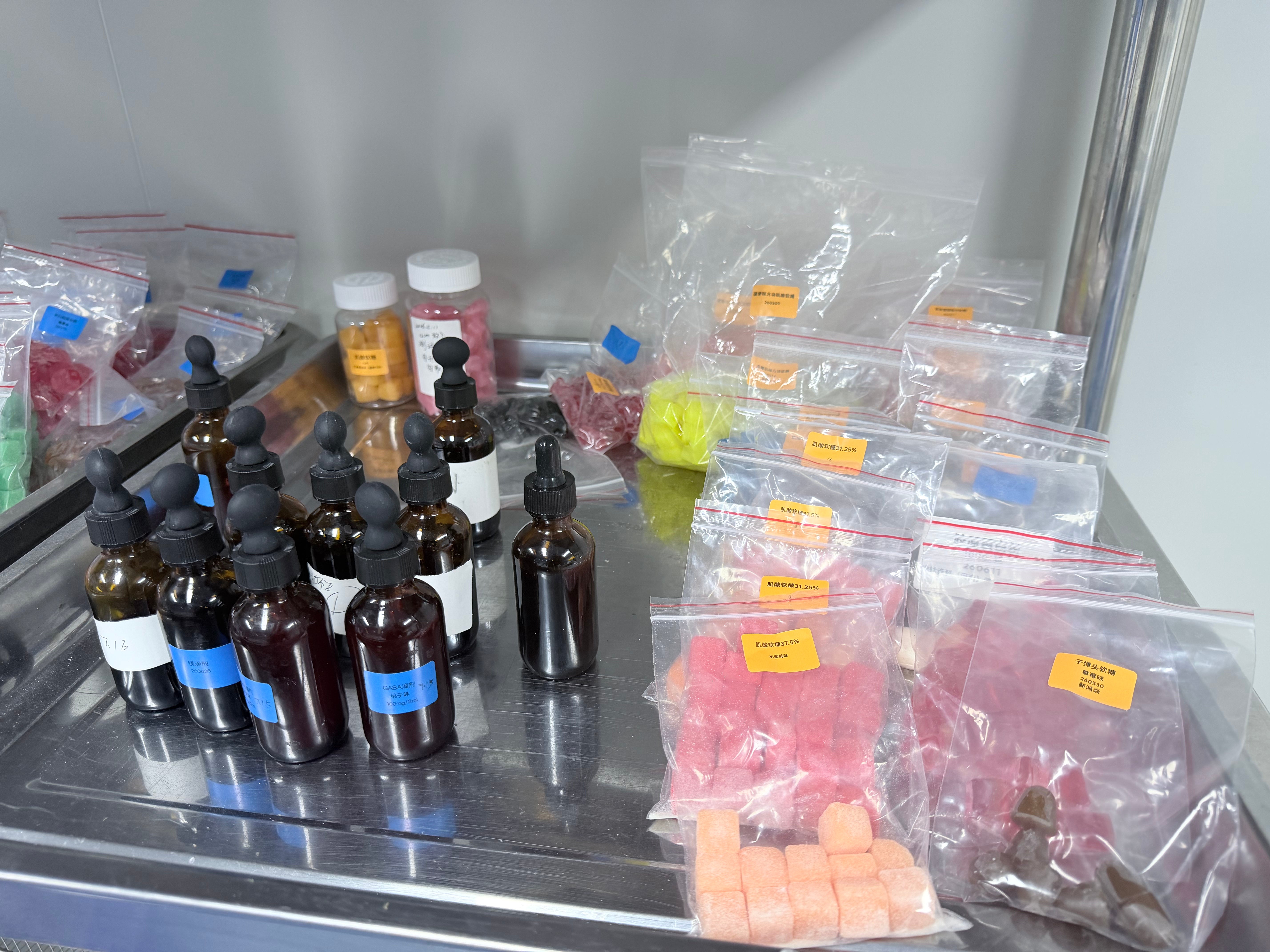 Supplement sample testing with gummy samples and liquid dropper bottles